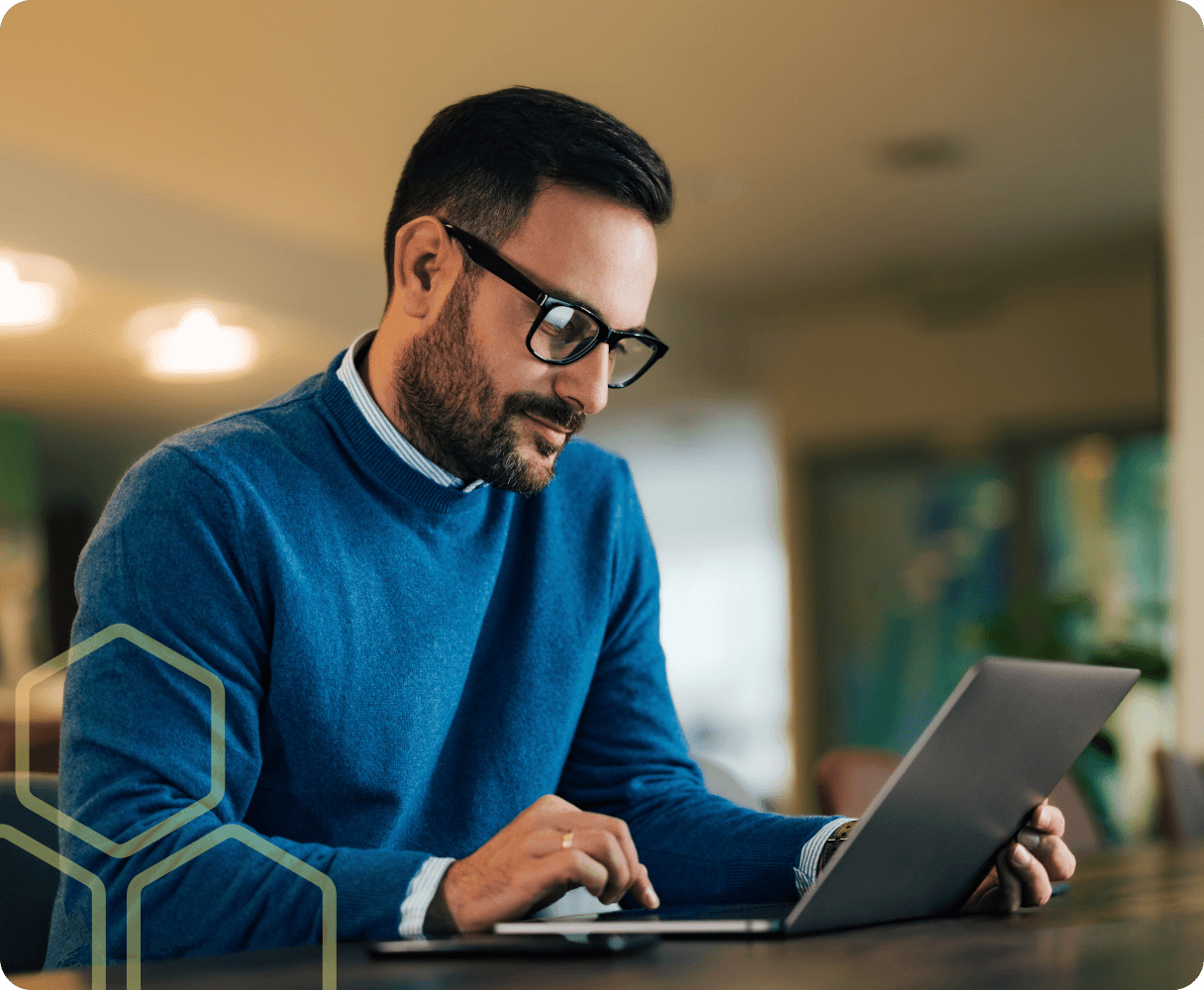 Image of someone working on a laptop